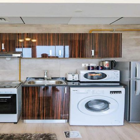 Oyo 860 Studio Apartment, Maya Tower 4, Jumeirah Village Triangle Dubai Exterior photo