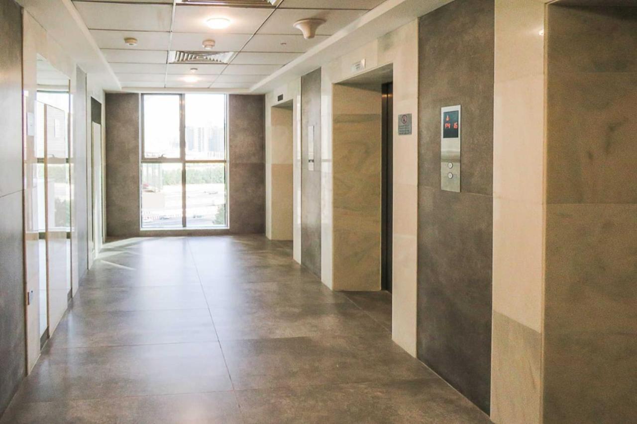 Oyo 860 Studio Apartment, Maya Tower 4, Jumeirah Village Triangle Dubai Exterior photo
